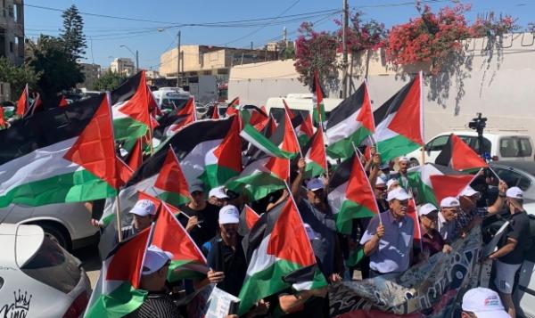 الاحتلال يعتدي على مسيرة الإعلام الفلسطينية شرق غزة