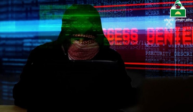 ملثم "سايبر طوفان الأقصى" يعلن اختراق وزارة الدفاع الإسرائيلية