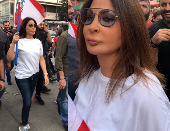 بالفيديو ..  تظاهرات لبنان تحولت لساحات استعراض وإليسا تنافس هيفاء وهبي في الميدان