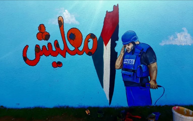 وائل الدحدوح على جدارية بإدلب السورية