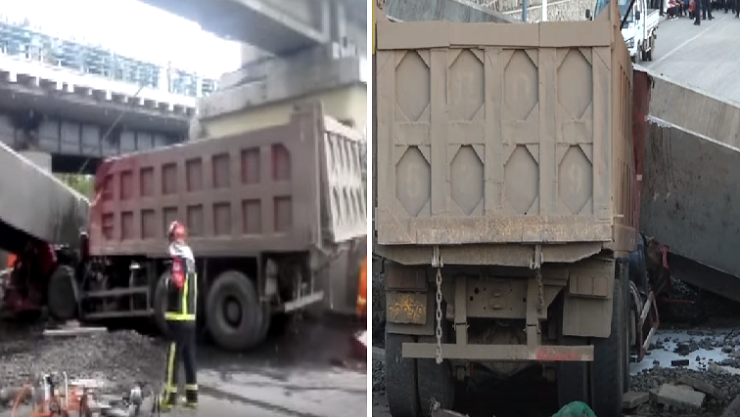 بالفيديو ..  شاحنة ضخمة تشقُّ جسراً إلى نصفين!