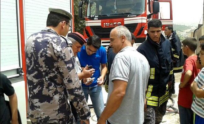 بالصور .. إنقاذ عائلة احترق منزلها في عجلون