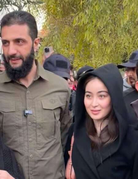 بالفيديو ..  الفتاة السورية "ليا خير الله": (الجولاني) طلب مني بلطف وأبوية أن أغطّي شعري قبل التقاط الصورة معه
