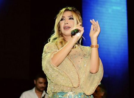 أربعينية نوال الزغبي والفستان القصير «دونت ميكس» ..  صور