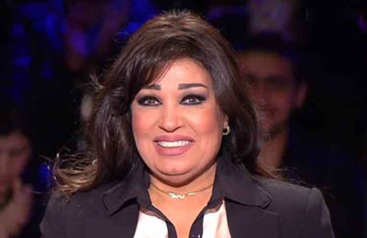 بالصور  ..  فيفي عبده أمريكا أمنت على قدمي بملايين الدولارات