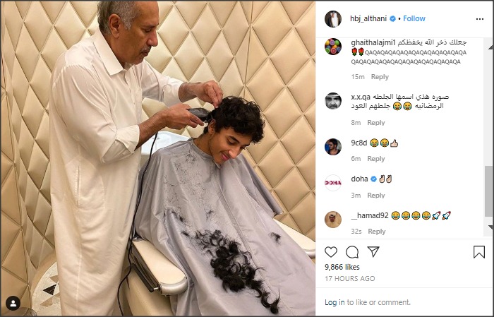رئيس وزراء قطر السابق حمد بن جاسم يعمل حلاقاً لقص شعر ابنه ..  صورة