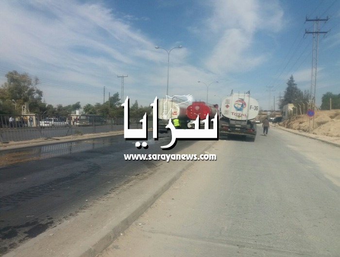 بالصور ..  العناية الإلهية تحول دون وقوع كارثة في الزرقاء بعد تصادم صهريجي نفط على الشارع العام
