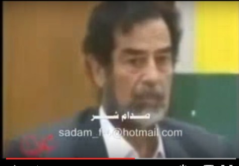 فيديو "نادر"  ..  مصور يحاول أن يعتدى على صدام حسين  ..  فماذا كانت ردة فعله