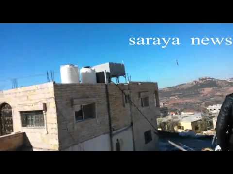  لحظة سقوط (6) أعمدة كهرباء على منازل و تحطيم مركبات في عنجرة