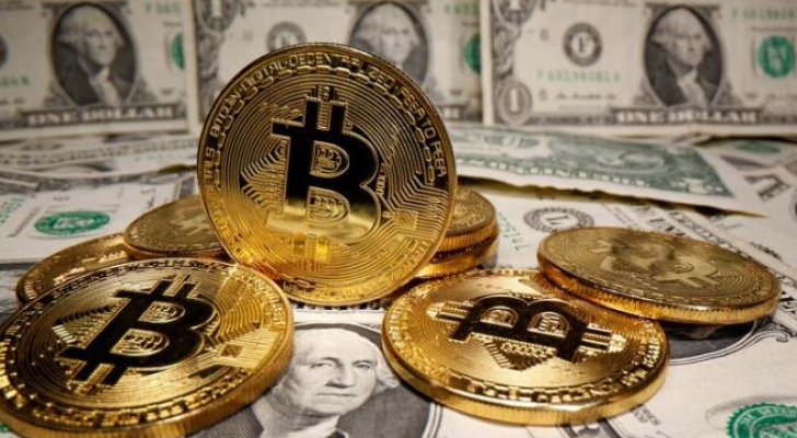 بيتكوين تتجاوز لأول مرة عتبة 60 ألف دولار