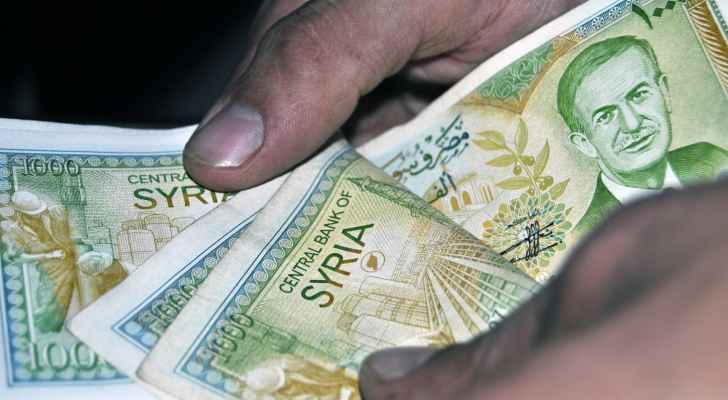 ضعف الطلب على الليرة السورية يخفض أسعار صرفها في الأردن 