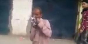 فيديو صادم  ..  يمني يثير الجدل بتناوله حمامة نيئة أمام المارة