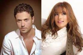 هكذا احتفلت زينة بانتصارها على أحمد عز في قضية التوأم ..  شاهد