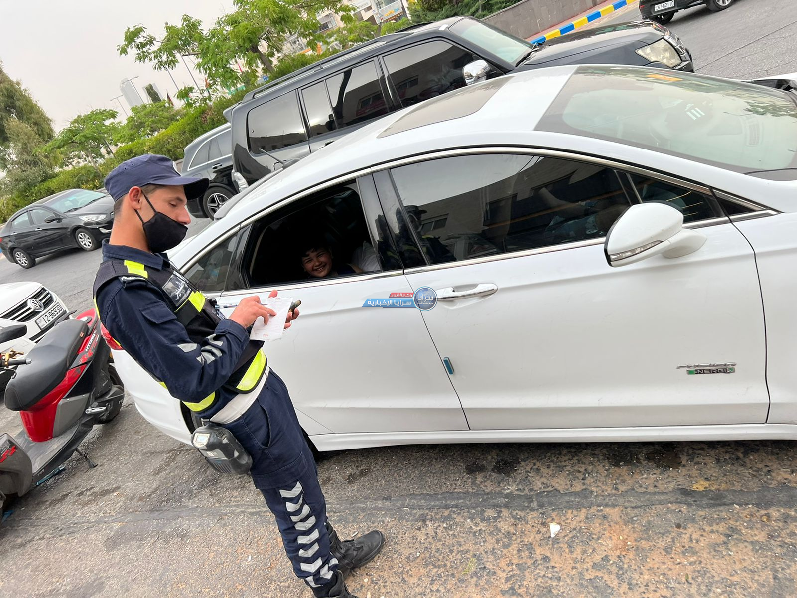 بالصور ..  رقيب سير يحرر مخالفة "طريفة" لطفل في عمان ووالده يروي لـ"سرايا" التفاصيل