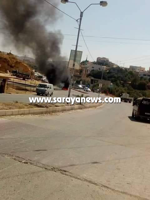 بالصور ..  اربد: تماس كهربائي يتسبب باحتراق مركبة في لواء الكورة
