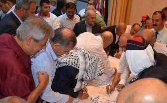 اهالي الفحيص وماحص يوقعون وثيقه شرف بعدم اطلاق العيارات النارية