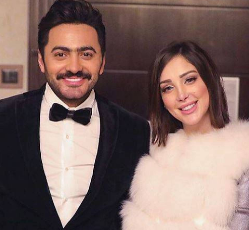 بالفيديو .. تامر حسني يتغزل بنجاح زوجته ..  وبسمة بوسيل ترد